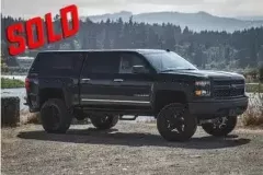 2015ChevSilverado15006Lift20WheelsRhinoLinedFenderFlares