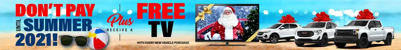 Car dealership promotion offering no payments until summer 2021, plus a free TV with new car purchase.