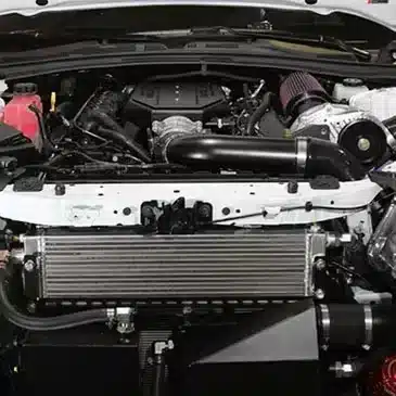High-performance Corvette engine with detailed components, showcasing advanced automotive engineering.