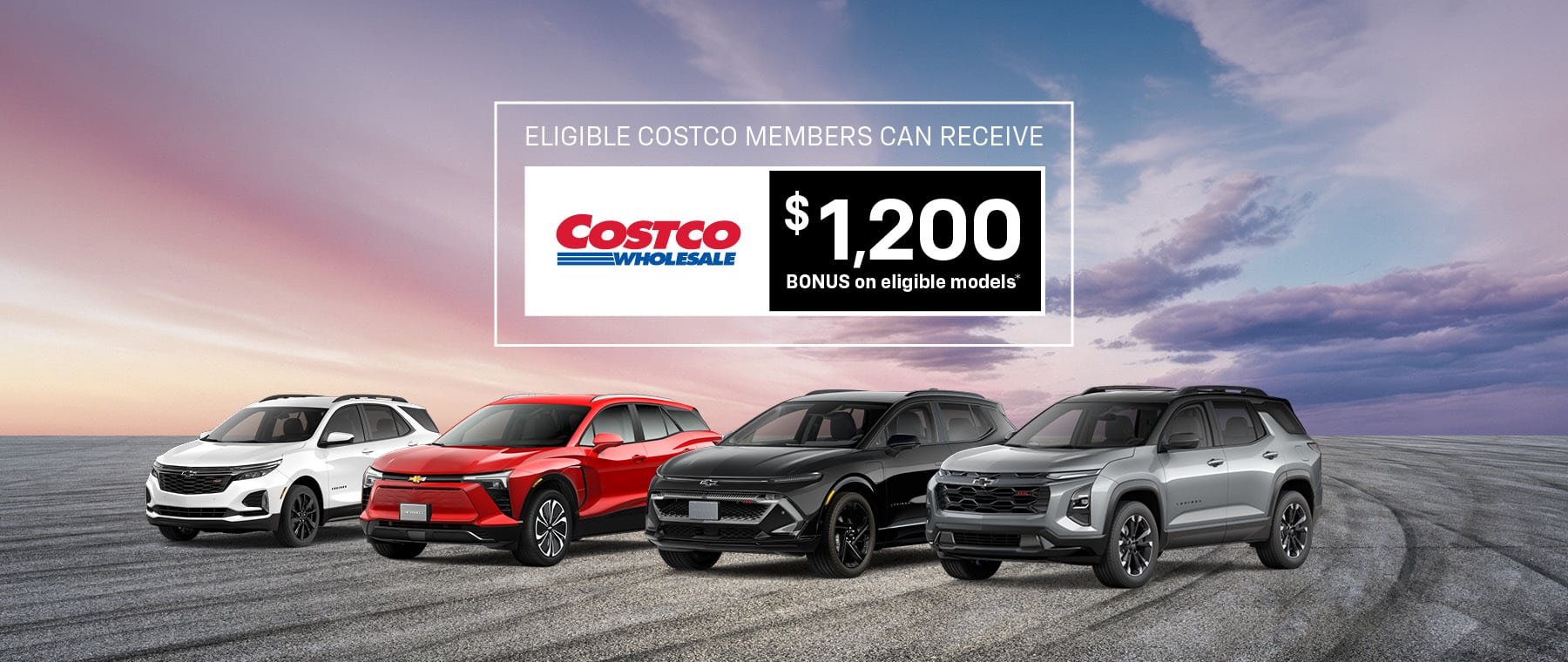 Advertisement for a car sales event titled Drive into Spring featuring three vehicles on a road, with trees and leaves in the background. A sign highlights Great Inventory Available Now! Starting at just $19,921. Button reads View Inventory.